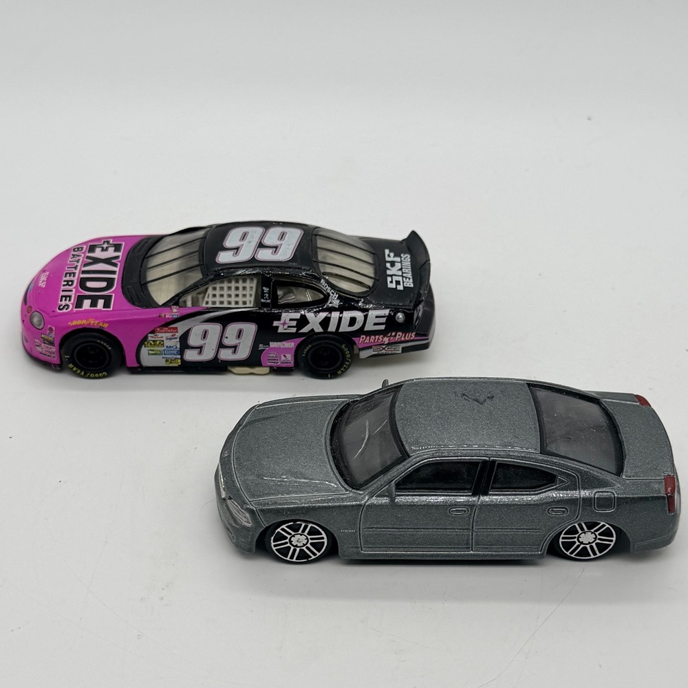 2006 Dodge Charger & #99 Exide Batteries Ford Taurus NASCAR Diecast Cars - Lot 2 - Picture 2 of 8